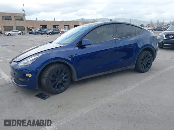 2022 Tesla Model Y Long Range with VIN 7SAYGDEE6NF480146, listed as a IAAI auction lot 41906361 with 31,939 mi miles and . Bid and sale history available at carsss.com. Image 2.