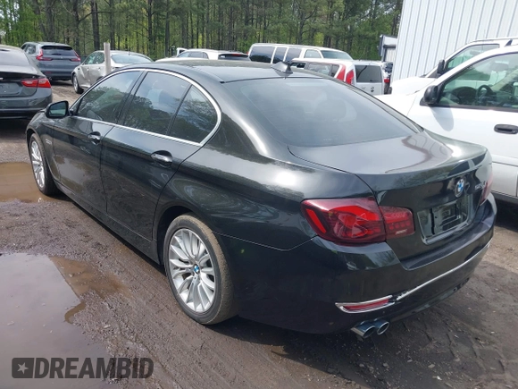 2016 BMW 5 Series 528i xDrive with VIN WBA5A7C57GG643446, listed as a IAAI auction lot 42039384 with 132,119 mi miles. Bid and sale history available at carsss.com. Image 3.