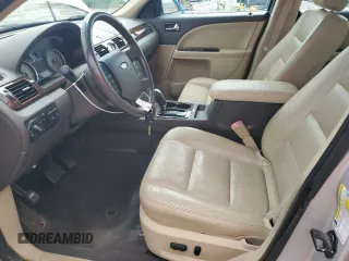 2009 Ford Taurus Limited z VIN 1FAHP25W59G101519, wystawiony jako Copart lot #55035935 z przebiegiem 142 496 mil mil oraz Szkody całkowita. Historia ofert i sprzedaży dostępna na DreamBid. Obrazek 7.