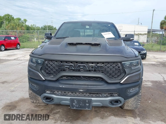 2021 Ram 1500 TRX with VIN 1C6SRFU98MN820577, listed as a IAAI auction lot 42652005 with 43,429 mi miles and . Bid and sale history available at DreamBid. Image 6.