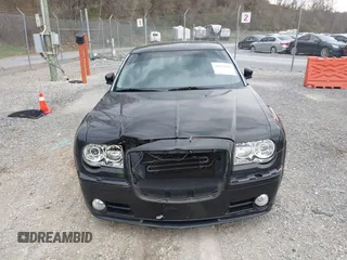2006 Chrysler 300 C SRT8 with VIN 2C3KA73W06H239927, listed as a IAAI auction lot 41837066 with 169,260 mi miles. Bid and sale history available at carsss.com. Image 6.