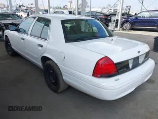 2009 Ford Police Interceptor with VIN 2FAHP71V29X129265, listed as a IAAI auction lot 42381382 with Not provided miles and . Bid and sale history available at DreamBid. Image 3.