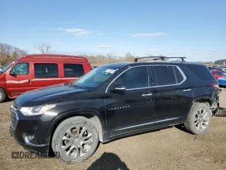 2018 Chevrolet Traverse Premier with VIN 1GNEVJKW5JJ152423, listed as a Copart auction lot 51202685 with 124,673 mi miles and Salvage Title. Bid and sale history available at DreamBid. Image 1.