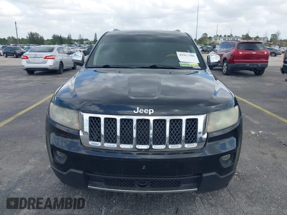 2012 Jeep Grand Cherokee Overland with VIN 1C4RJECT4CC299549, listed as a IAAI auction lot 41917306 with 229,256 mi miles. Bid and sale history available at carsss.com. Image 12.
