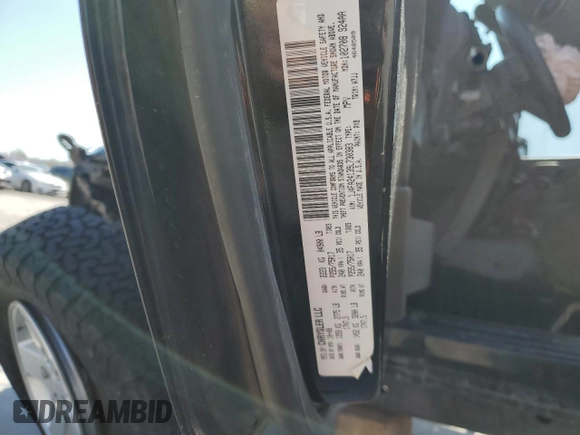 2009 Jeep Wrangler X with VIN 1J4FA24139L730383, listed as a Copart auction lot 51914935 with 168,265 mi miles and Salvage Title. Bid and sale history available at DreamBid. Image 14.