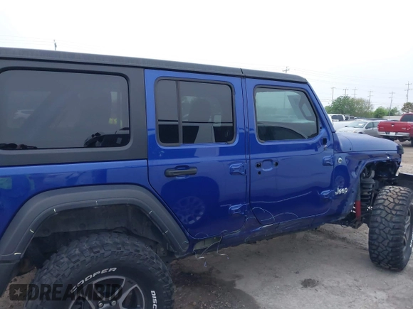 2019 Jeep Wrangler Unlimited Sport Altitude with VIN 1C4HJXDG6KW578572, listed as a IAAI auction lot 41921919 with 30,247 mi miles and . Bid and sale history available at DreamBid. Image 14.