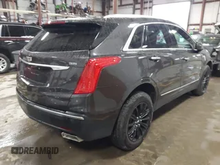 2018 Cadillac XT5 Luxury FWD with VIN 1GYKNCRS8JZ184322, listed as a IAAI auction lot 41225319 with 97,729 mi miles and . Bid and sale history available at carsss.com. Image 4.