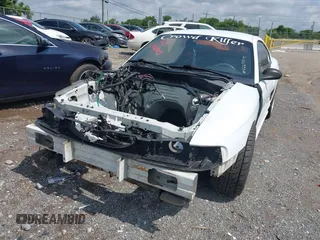 1994 Ford Mustang GT z VIN 1FALP42T0RF155834, wystawiony jako IAAI lot #42698515 z przebiegiem 146 338 mil mil oraz . Historia ofert i sprzedaży dostępna na DreamBid. Obrazek 6.