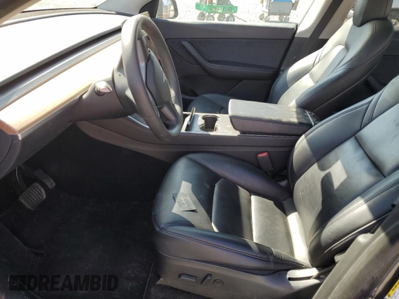 2020 Tesla Model Y Long Range with VIN 5YJYGDEEXLF017789, listed as a Copart auction lot 52705185 with 49,470 mi miles and Salvage Title. Bid and sale history available at DreamBid. Image 7.