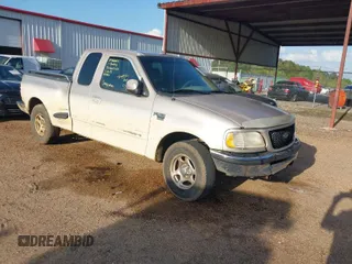 1998 Ford F-150 XL with VIN 1FTRX07L1WKA76665, listed as a IAAI auction lot 41863626 with 30,654 mi miles. Bid and sale history available at carsss.com. Image 1.