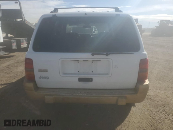 1998 Jeep Grand Cherokee Laredo with VIN 1J4GZ58S9WC361042, listed as a Copart auction lot 46802365 with 236,923 mi miles and Salvage Title. Bid and sale history available at carsss.com. Image 6.