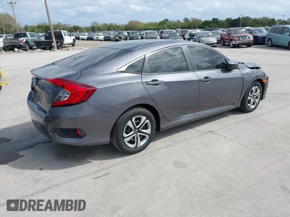 2018 Honda Civic Sedan LX with VIN 19XFC2F59JE044099, listed as a IAAI auction lot 41719337 with 44,534 mi miles. Bid and sale history available at carsss.com. Image 4.