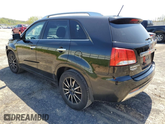 2013 Kia Sorento SX z VIN 5XYKW4A29DG382771, wystawiony jako Copart lot #55823745 z przebiegiem 279 700 mil mil oraz Szkoda całkowita • Salvage title. Historia ofert i sprzedaży dostępna na DreamBid. Obrazek 2.