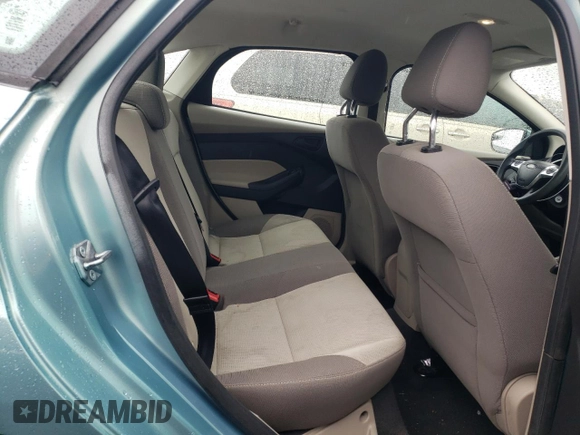 2012 Ford Focus SE с VIN 1FAHP3F23CL219200, выставлен на аукционе Copart как лот 55843635 с пробегом 118 084 миль миль и Списание • Salvage title. История ставок и продаж доступна на DreamBid. Изображение 10.