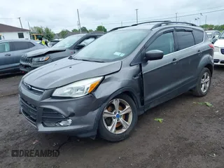 2013 Ford Escape SE with VIN 1FMCU9GX9DUA57901, listed as a IAAI auction lot 42367615 with 140,000 mi miles and . Bid and sale history available at DreamBid. Image 2.