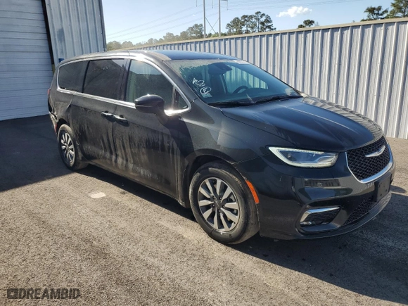2023 Chrysler Pacifica Hybrid Touring L with VIN 2C4RC1L7XPR592181, listed as a Copart auction lot 52144505 with 45,770 mi miles and Salvage Title. Bid and sale history available at carsss.com. Image 4.
