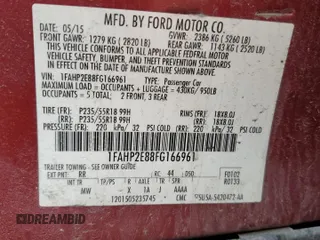 2015 Ford Taurus SEL with VIN 1FAHP2E88FG166961, listed as a Copart auction lot 61429255 with 124,780 mi miles and Salvage title. Bid and sale history available at DreamBid. Image 12.
