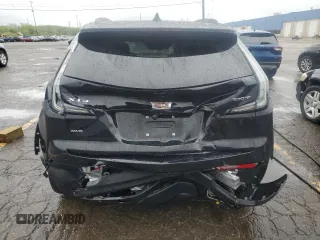 2022 Cadillac XT4 AWD Sport с VIN 1GYFZFR46NF170841, выставлен на аукционе Copart как лот 55863705 с пробегом 14 745 миль миль и Списание • Salvage title. История ставок и продаж доступна на DreamBid. Изображение 6.