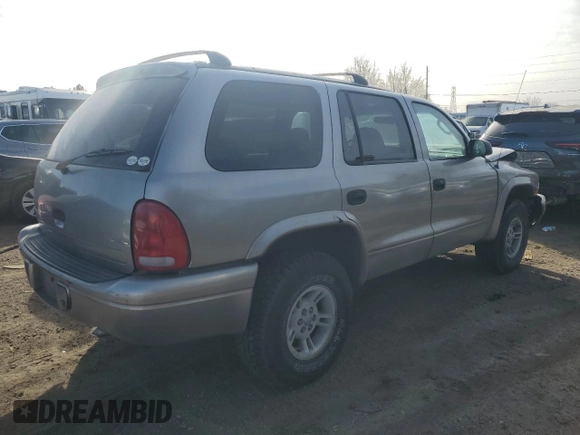 2000 Dodge Durango with VIN 1B4HS28Z6YF255687, listed as a Copart auction lot 84959164 with 189,369 mi miles and Salvage Title. Bid and sale history available at DreamBid. Image 3.