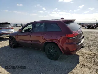 2020 Jeep Grand Cherokee Laredo E with VIN 1C4RJEAG2LC379633, listed as a Copart auction lot 58437555 with 57,219 mi miles and Salvage title. Bid and sale history available at DreamBid. Image 2.
