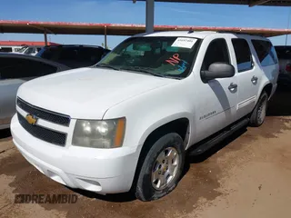 2010 Chevrolet Suburban LS with VIN 1GNUCHE01AR174986, listed as a IAAI auction lot 41697401 with 333,135 mi miles. Bid and sale history available at carsss.com. Image 2.