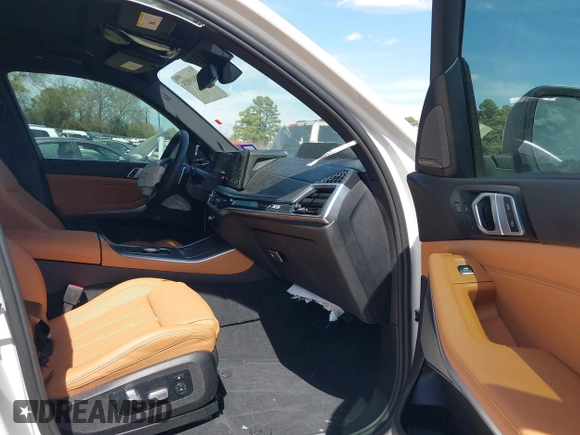2024 BMW X5 xDrive50e with VIN 5UX43EU05R9T41661, listed as a IAAI auction lot 41819833 with 24,407 mi miles. Bid and sale history available at carsss.com. Image 5.
