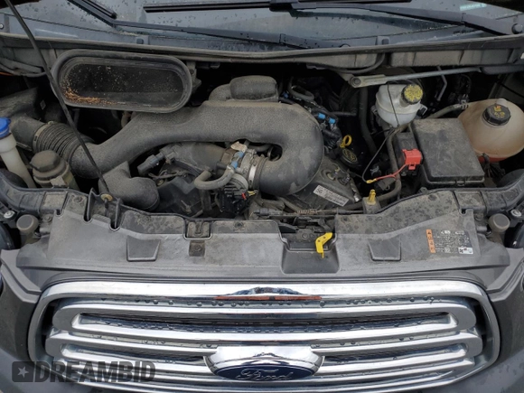 2018 Ford Transit Passenger XL z VIN 1FMZK1ZM3JKA12688, wystawiony jako Copart lot #60635335 z przebiegiem 121 509 mil mil oraz Szkoda całkowita • Salvage title. Historia ofert i sprzedaży dostępna na DreamBid. Obrazek 12.
