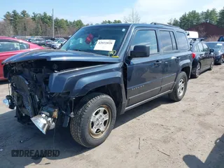 2014 Jeep Patriot Sport with VIN 1C4NJRBB8ED778620, listed as a IAAI auction lot 42021020 with 140,736 mi miles. Bid and sale history available at carsss.com. Image 2.