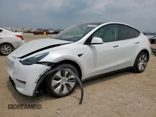 2024 Tesla Model Y Long Range with VIN 7SAYGDEE6RA290124, listed as a Copart auction lot 57662385 with 14,751 mi miles and Salvage title. Bid and sale history available at DreamBid. Image 1.