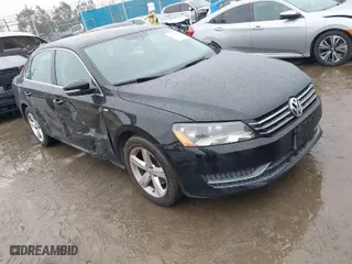 2014 Volkswagen Passat Wolfsburg Ed with VIN 1VWAT7A35EC038601, listed as a IAAI auction lot 41730628 with 127,024 mi miles. Bid and sale history available at carsss.com. Image 1.