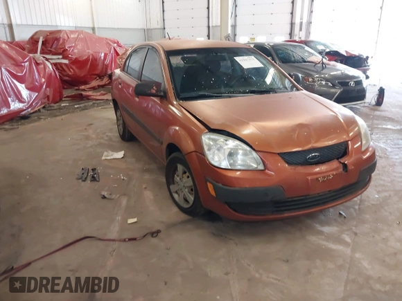 2009 Kia Rio LX with VIN KNADE223796547229, listed as a IAAI auction lot 41947371 with 153,061 mi miles and . Bid and sale history available at DreamBid. Image 1.
