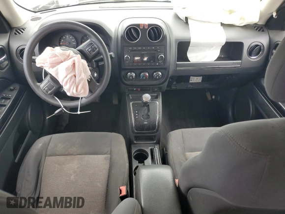2011 Jeep Patriot Sport with VIN 1J4NT1GBXBD146292, listed as a Copart auction lot 56982555 with 241,524 mi miles and Salvage title. Bid and sale history available at DreamBid. Image 8.