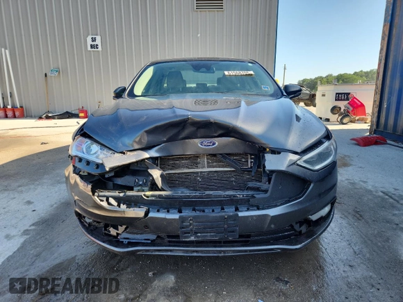 2017 Ford Fusion Titanium z VIN 3FA6P0D96HR251752, wystawiony jako Copart lot #61568705 z przebiegiem 173 479 mil mil oraz Nie do naprawy • Non repairable. Historia ofert i sprzedaży dostępna na DreamBid. Obrazek 5.