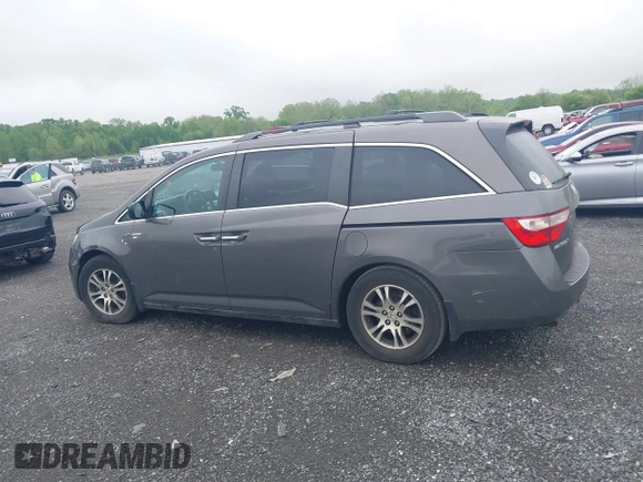 2012 Honda Odyssey EX-L with VIN 5FNRL5H64CB060468, listed as a IAAI auction lot 42182501 with 236,399 mi miles and . Bid and sale history available at carsss.com. Image 14.