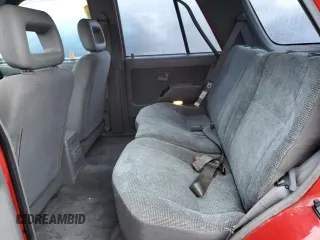 1996 Honda Passport z VIN 4S6CM58V3T4400052, wystawiony jako Copart lot #41616755 z przebiegiem 134 910 mil mil oraz Szkody całkowita. Historia ofert i sprzedaży dostępna na DreamBid. Obrazek 11.