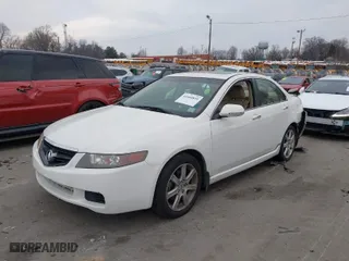 2004 Acura TSX w/Navigation with VIN JH4CL96924C029114, listed as a IAAI auction lot 41660839 with 227,721 mi miles. Bid and sale history available at carsss.com. Image 2.