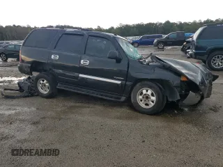 2003 GMC Yukon SLT with VIN 1GKEC13Z03R244247, listed as a Copart auction lot 65952894 with 0 mi miles and Salvage Title. Bid and sale history available at carsss.com. Image 4.