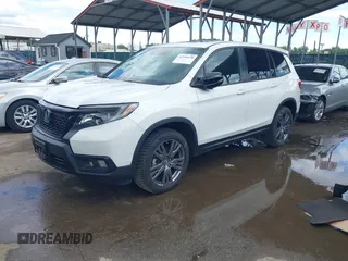 2021 Honda Passport EX-L with VIN 5FNYF8H54MB041738, listed as a IAAI auction lot 42310470 with 52,409 mi miles and . Bid and sale history available at DreamBid. Image 2.
