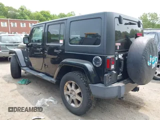 2015 Jeep Wrangler Unlimited Sahara with VIN 1C4HJWEG3FL661568, listed as a IAAI auction lot 42387810 with 140,927 mi miles and . Bid and sale history available at DreamBid. Image 3.