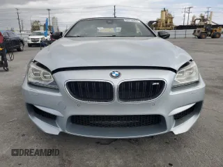 2014 BMW M6 z VIN WBSLZ9C50EDZ78344, wystawiony jako Copart lot #54719265 z przebiegiem 59 556 mil mil oraz Szkoda całkowita • Salvage title. Historia ofert i sprzedaży dostępna na DreamBid. Obrazek 5.