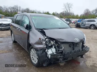 2015 Toyota Sienna XLE with VIN 5TDYK3DC8FS651580, listed as a IAAI auction lot 41971867 with 49,711 mi miles. Bid and sale history available at carsss.com. Image 6.