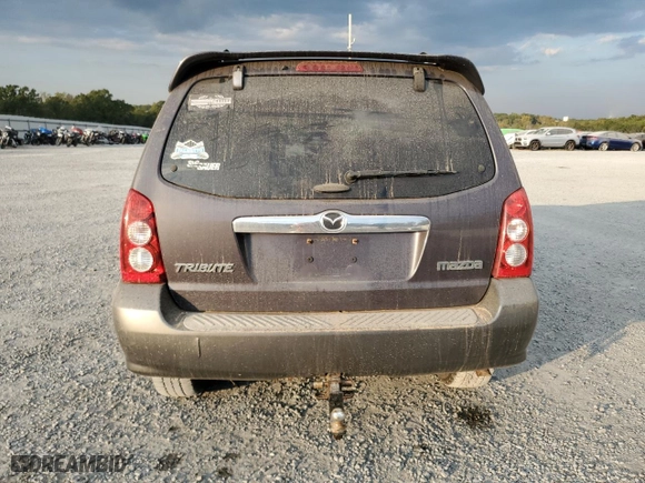 2006 Mazda Tribute s with VIN 4F2YZ96126KM10552, listed as a Copart auction lot 73911104 with 0 mi miles and Salvage Title. Bid and sale history available at carsss.com. Image 6.