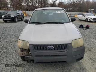 2004 Ford Escape with VIN 1FMCU02144KB63439, listed as a Copart auction lot 85310514 with 275,625 mi miles and Salvage title. Bid and sale history available at DreamBid. Image 5.