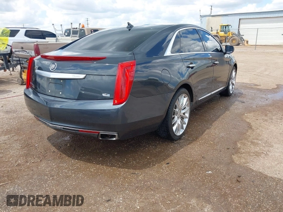 2013 Cadillac XTS Platinum z VIN 2G61V5S32D9102537, wystawiony jako IAAI lot #42230895 z przebiegiem 120 810 mil mil oraz . Historia ofert i sprzedaży dostępna na DreamBid. Obrazek 4.