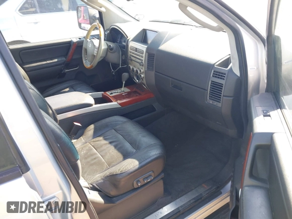 2004 Infiniti QX56 with VIN 5N3AA08CX4N810912, listed as a IAAI auction lot 41419673 with 169,057 mi miles. Bid and sale history available at carsss.com. Image 5.