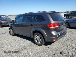 2014 Dodge Journey SXT with VIN 3C4PDCBG4ET211324, listed as a Copart auction lot 53255785 with 187,126 mi miles and Salvage Title. Bid and sale history available at carsss.com. Image 2.