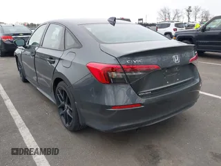 2022 Honda Civic Sport z VIN 2HGFE2F51NH597755, wystawiony jako IAAI lot #42006031 z przebiegiem 33 511 mil mil oraz . Historia ofert i sprzedaży dostępna na DreamBid. Obrazek 3.
