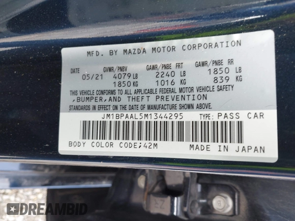 2021 Mazda 3 S with VIN JM1BPAAL5M1344295, listed as a IAAI auction lot 41499549 with 35,513 mi miles and . Bid and sale history available at DreamBid. Image 9.