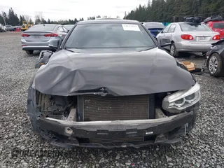 2014 BMW 4 Series 428i with VIN WBA3N3C50EK230489, listed as a IAAI auction lot 41613944 with 86,553 mi miles and . Bid and sale history available at DreamBid. Image 13.