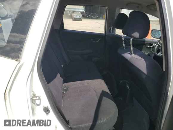 2013 Honda Fit Sport с VIN JHMGE8H54DC072949, выставлен на аукционе Copart как лот 57798645 с пробегом 45 886 миль миль и Списание • Salvage title. История ставок и продаж доступна на DreamBid. Изображение 10.